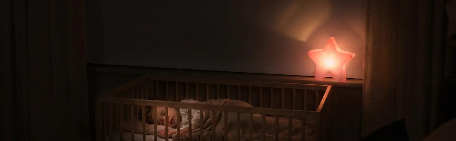 White made-to-measure, blackout roller blind for children’s nurseries and bedroom, creating a dark sleep environment